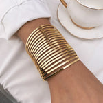 Waterproof 18K gold multi band wide corset cuff bracelet Biya Accessoires UAE.