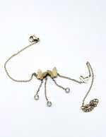 18K gold dainty butterfly tassel bracelet by Biya Accessoires.