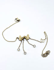 18K gold dainty butterfly tassel bracelet by Biya Accessoires.
