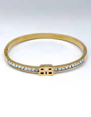 Modern luxury fine art editorial gold jewelry designer inspired signature bracelet gift for her.