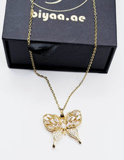 Close-up of premium hypoallergenic imitation jewelry featuring a pave butterfly.