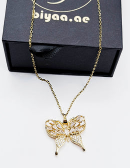 Close-up of premium hypoallergenic imitation jewelry featuring a pave butterfly.