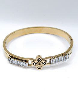 Modern luxury fine art editorial gold jewelry baguette stone bracelet gift for her.