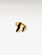 18K gold plated black enamel abstract bypass ring by Biya Accessoires.