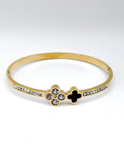 Modern luxury fine art editorial jewelry heritage bypass clover gift for her.