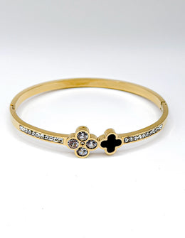 Modern luxury fine art editorial jewelry heritage bypass clover gift for her.