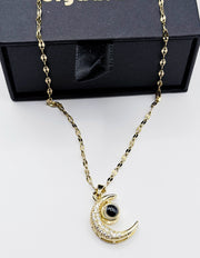 Waterproof gold moon pendant with hidden message in 100 languages Dubai.