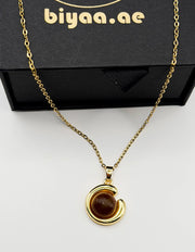 18K gold plated crescent moon pendant with golden cat's eye stone.