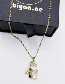 Hypoallergenic non-tarnish double pendant necklace with cubic zirconia.