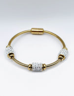 Modern luxury fine art editorial jewelry fluid gold chain bracelet gift for her.