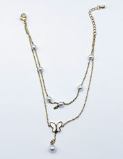Hypoallergenic non-tarnish dainty gold pearlescent butterfly bangle UAE.