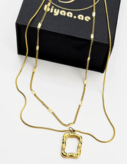18K gold plated double layered organic rectangle necklace by Biya Accessoires.