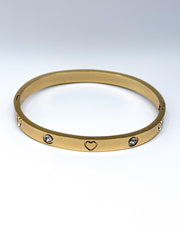 Modern luxury fine art editorial jewelry engraved heart bracelet gift for her.