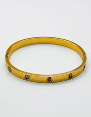 18K gold plated flush crystal flat band bangle by Biya Accessoires.