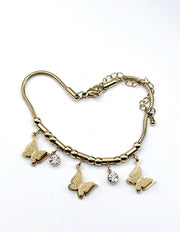 Modern luxury fine art editorial jewelry delicate gold chain bracelet gift for her.