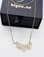Luxury gold and cubic zirconia floral bouquet necklace Dubai.