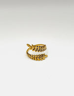 18K gold plated laurel leaf bypass open ring by Biya Accessoires.