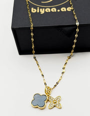 18K gold plated layered black clover and crystal flower pendant.