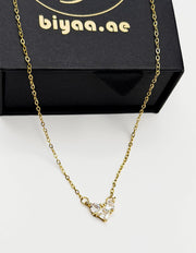 18K gold plated multi stone crystal heart necklace by Biya Accessoires.