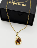 Modern luxury teardrop stone pendant necklace Dubai.