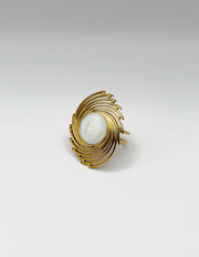 18K gold plated oversized sunburst pearl statement ring by Biya Accessoires.