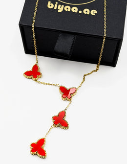 Designer inspired gold and red butterfly drop necklace gift box.