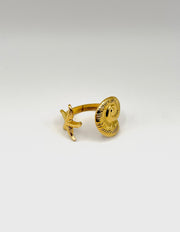 18K gold plated starfish and ammonite shell open ring by Biya Accessoires.