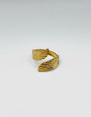 18K gold plated textured angel wing bypass ring by Biya Accessoires.