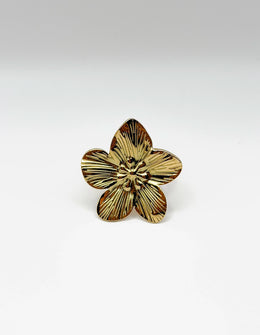 18K gold plated oversized sculpted floral statement ring by Biya Accessoires.