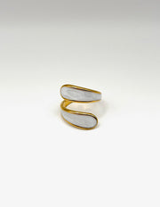 18K gold plated thick marbled white enamel bypass ring by Biya Accessoires.
