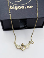 18K gold plated winged heart crown necklace by Biya Accessoires.