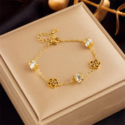 Hypoallergenic non-tarnish high polish gold crystal station bangle UAE.