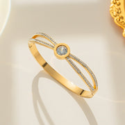 Hypoallergenic non-tarnish high polish gold hinge clasp bangle UAE.