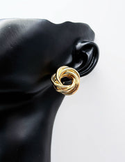 Close-up of premium hypoallergenic imitation jewelry featuring heart and pearl earrings.