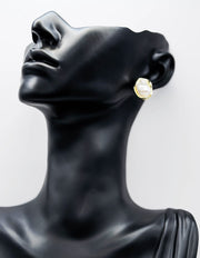 Everyday luxury fashion jewelry gold tone statement studs by Biya Accessoires Dubai.