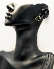 Close-up of premium hypoallergenic imitation jewelry featuring a black flower design.