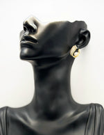 Best fashion jewelry in UAE minimalist pearl shell earrings for women.