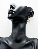 Everyday luxury fashion jewelry gold tone hoop drops by Biya Accessoires Dubai.