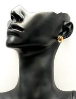 Everyday luxury fashion jewelry gold tone statement studs by Biya Accessoires Dubai.