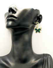 Best imitation jewellery brands in uae gold butterfly dangles with green crystals.