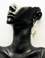 Best imitation jewellery brands in uae gold chandelier earrings with floating moonstone and crystals.