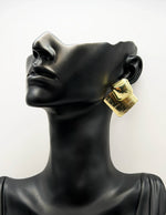 Everyday luxury jewelry uae modern geometric dangles from best jewelry shop in UAE.