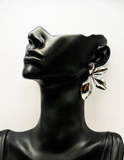 Biya Accessoires artificial jewellery online dubai molten silver leaf statement studs.