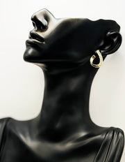 Best imitation jewelry brand in UAE crystal open hoop earrings.