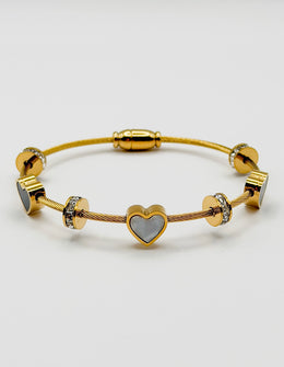 Non-tarnish luxury gold and black enamel heart bracelet for women.