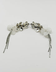 Close up of imitation jewelry uae statement drops featuring textured blooms and white petals.
