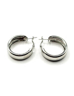 Best fashion jewelry in UAE thick silver statement hoops for women.