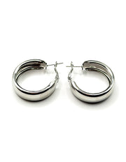 Best fashion jewelry in UAE thick silver statement hoops for women.