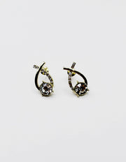 Biya Accessoires gold crystal infinity stud earrings.