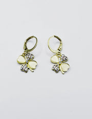 Best fashion jewelry in UAE opal effect and crystal clover earrings.